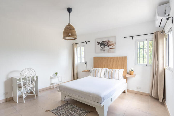 Apartamento jardín: dormitorio Apartamento jardín: dormitorio